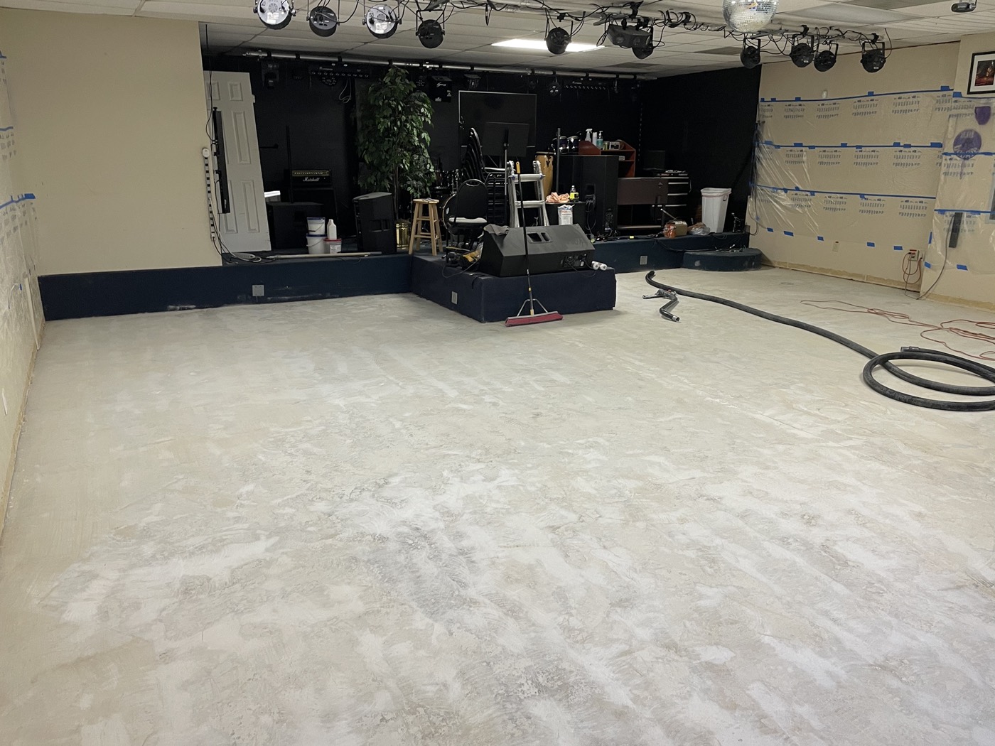 Exposed and prepared concrete floor at Rat's Music Studio before the new finish