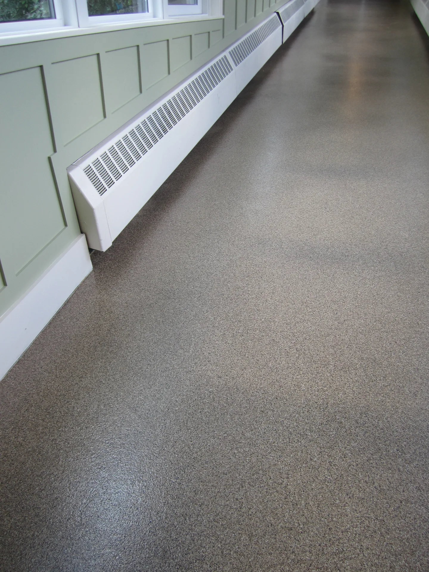 Close view of a fine-grain grey quartz broadcast floor